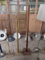 Brass standard lamp {140 cm H} and mahogany standard lamp {166 cm H}.