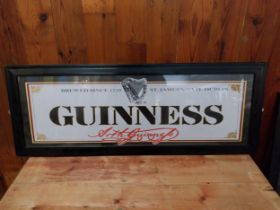 Guinness coloured framed advertising print {38 cm H x 101 cm W}.