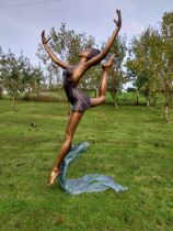 Exceptional quality bronze sculpture of a ballerina in motion {178cm H x 102cm W x 90cm D}