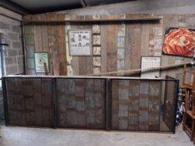 Vintage pine bar counter with metal mesh front {112 cm H x 358 cm W x69 cm D}.