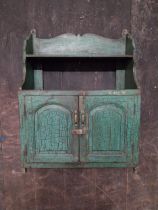 Painted pine wall hanging shelves with two arched panelled doors {79 cm H x 58 cm W x 25 cm D}.