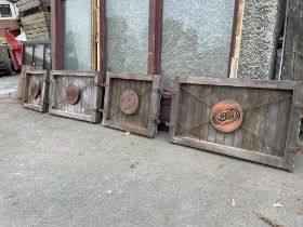 Four wooden panels with central copper Celtic motif and spiral twist supports {80 cm H x 520 cm W