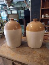Two early 20th C. glazed stoneware Whiskey jars {43 cm H x 27 cm Dia.}.