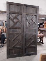 Film prop set of pine doors {257 cm H x 156 cm W x7 cm D}.