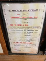 Framed telephone information sign {56 cm H x 33 cm W}.