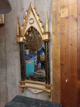 Decorative gilt wall mirror in the Gothic style {146 cm H x 57 cm W}.