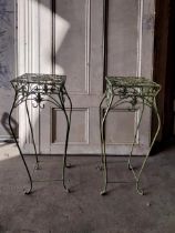 Pair of decorative painted metal plant stands {72 cm H x 30 cm W x 30 cm D}.