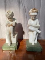 Pair of marble figures of Boys reading books. {86 cm H}.