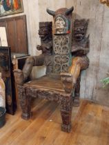 Rare unusual heavily carved hardwood tribal throne chair {185 cm H x 94 cm W x 110 cm D}.