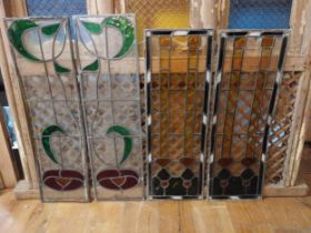 Four early 20th C. leaded stained glass panels {104 cm H x 39 cm W and 94 cm H x 33 cm W}.