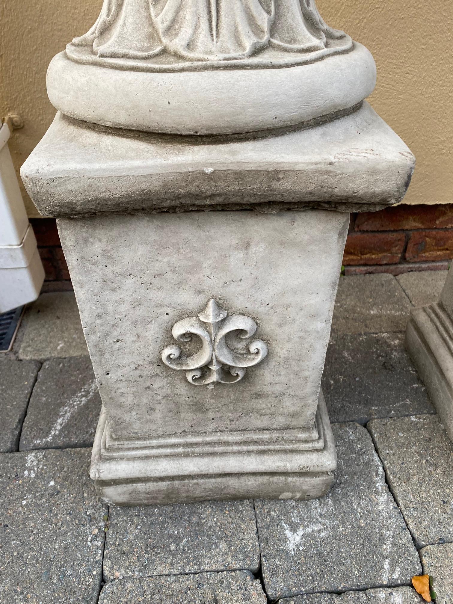 Pair of stone urns with leaf decoration on square pedestal bases. {96 cm H x 41 cm Dia.}. - Image 4 of 5