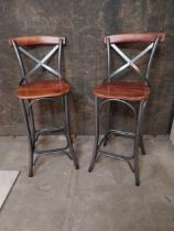 Pair of metal and wooden bar - pub stools in the Industrial style {118 cm H x 46 cm W x 52 cm D}.