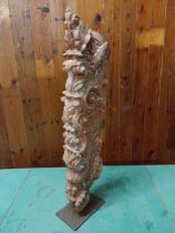 19th C. decorative hardwood sculpture raised on metal stand {83 cm H x 13 cm W x 23 cm D}.