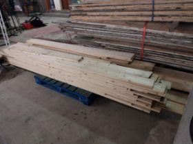 Approximately seventeen yards of pine floorboards