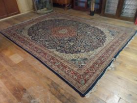 Decorative Persian carpet square {370 cm L x 275 cm W}.