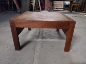 Mid-century teak square coffee table raised on square legs {36 cm H x 61 cm W x61 cm D}.