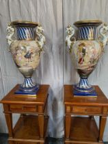 Large pair of vases with decorative panels and gilded dragon handles. {68 cm H}.