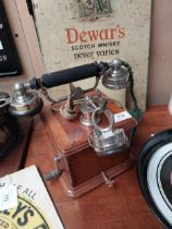 Early 1900's mahogany and chrome telephone. {24 cm H x 19 cm W x 19 cm D}