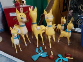 Collection of seven 1960's Perspex Babycham advertising deer's some with damage. {18 cm H}