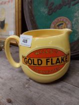 Wills's Gold Flake ceramic water jug. {12 cm H x 15 cm W x 12 cm D}.