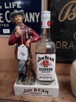 Jim Beam Kentucky Bourbon ceramic advertising bottle holder in the form of a Cowboy and bottle. {