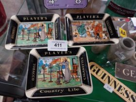 Three Player's Tobacco Country Life ceramic ashtrays. {9 cm W x 11 cm D}.