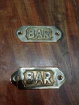 Pair of brass Bar signs {H 4cm x W 10cm }.