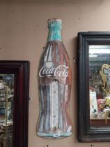 1970's Coca Cola tin plate thermometer in the form of a bottle. {74 cm H x 21 cm W}.