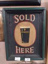 Guinness Sold Here framed wooden advertising board. {37 cm H x 28 cm W}.