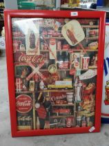 Framed Coca Cola jigsaw. {73 cm H x 57 cm W}.