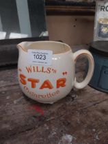 Wills's Star ceramic water jug. {11 cm H x 14 cm W x 10 cm D}