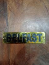 Belfast brass wall plaque {H 4cm x W 15cm }.