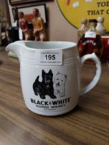 Black and White Scotch Whiskey ceramic advertising water jug. {13 cm H x 17 cm W x 11 cm D}.