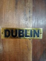 Dublin brass wall plaque {H 4cm x W 15cm }.