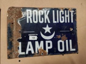 Rock Light Lamp Oil enamel double sided advertising sign. {26 cm H x 37 cm W}.