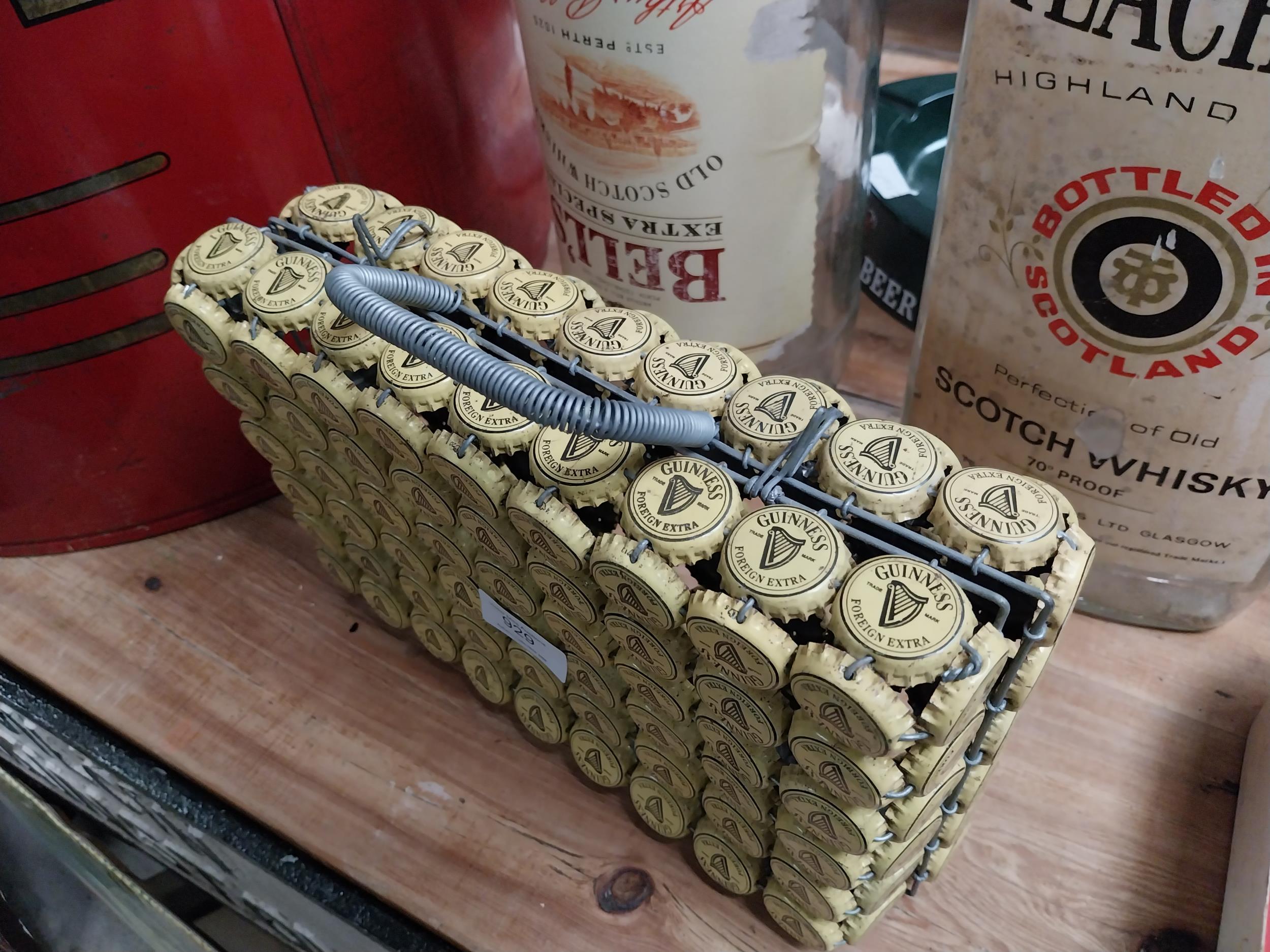 Handbag fashioned from Guinness bottle tops. {23 cm H x 28 cm W x 8 cm D}. - Image 2 of 2