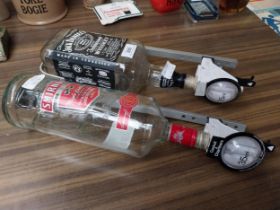 Optic with Jack Daniels bottle and Smirnoff bottle. {43 cm H x 14 cm W x 14 cm D}.