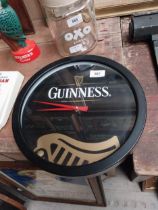 Guinness tin plate advertising clock {31 cm Diam}.