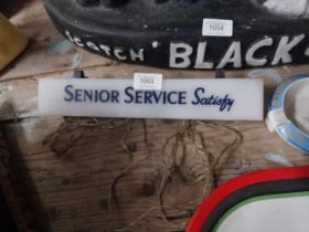 Senior Service Satisfy Perspex advertising shelf sign {7 cm H x 30 cm W x 5 cm D}.