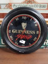 Guinness advertising clock. {22 cm W}.