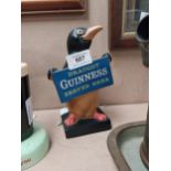 Guinness Draught Sold Here Ruberoid Penguin advertising figure. {18 cm H x 11 cm W x 8 cm D}.