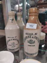 Two 19th C. stoneware ginger beer bottles - Osborne and Patton {20 cm H x 7 cm Dia. and Andrew A