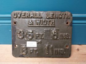 Overall Length and Width cast iron ridge plate. {18 cm H x 23 cm W}.