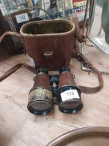 Pair of military binoculars in original metal case.