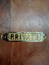 Private brass door sign {H 4cm x W 15cm }.