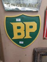 BP cast iron wall plaque. {33 cm H x 33 cm W}.