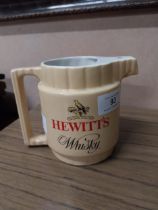 Hewitts Whiskey Cork Distilleries Arklow potter water jug. {12 cm H x 15 cm W x 9 cm D}.
