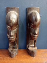 Set of two African ebony wood carved figures {H 24cm x W 7cm x D 8cm }.