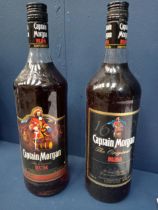 Two vintage bottles Captain Morgan original rum {1 Litre in size}.