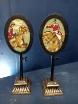 Pair of adjustable oval picture framed pole screens. {H 28cm x W 10cm x D 7cm}.